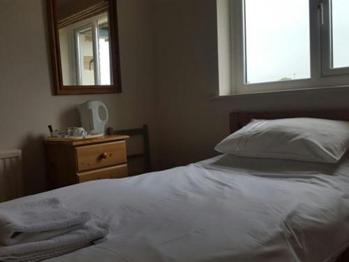 A35 Pit Stop Rooms Axminster Quarto foto